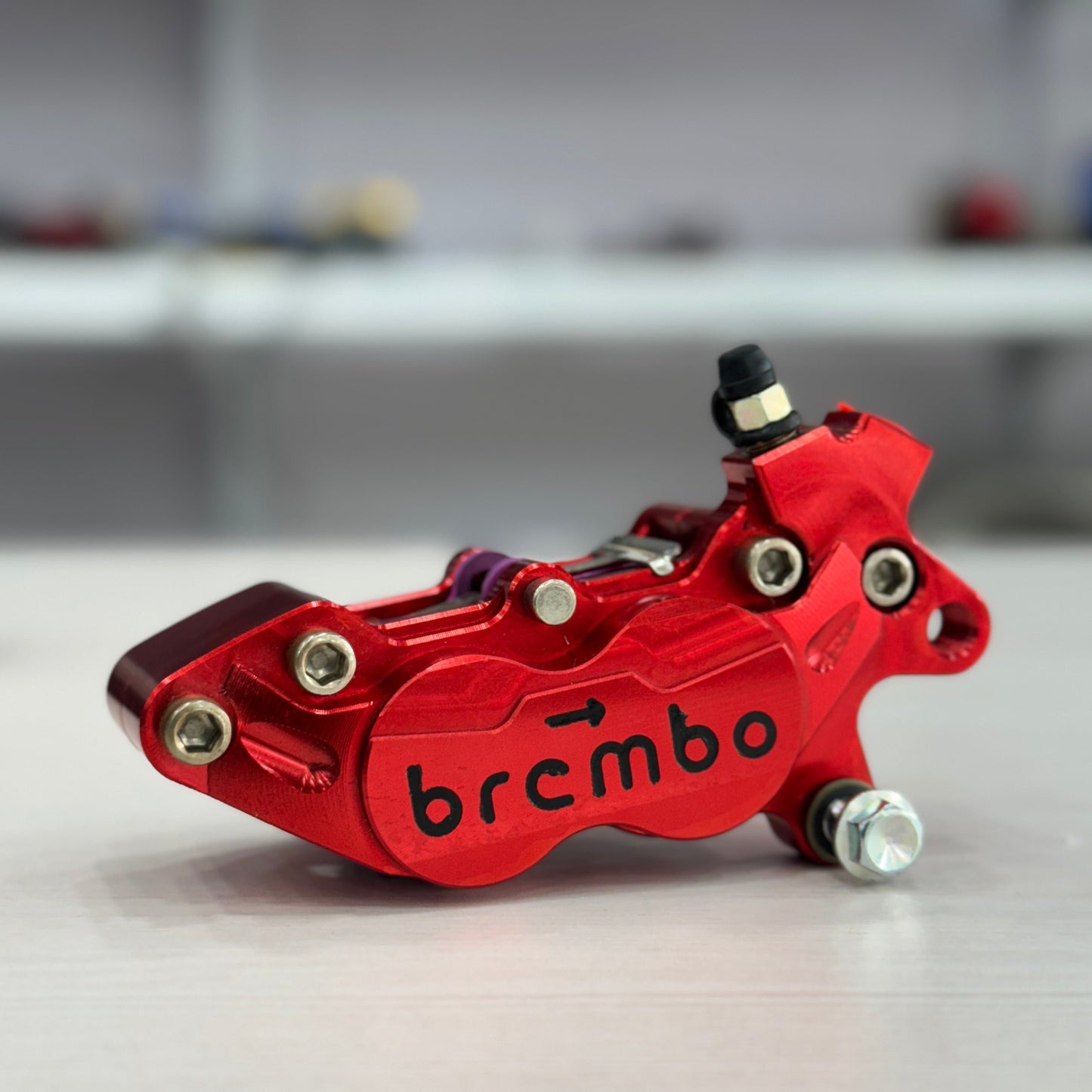 BREMBO CALIPER WITH BRAKE PADS